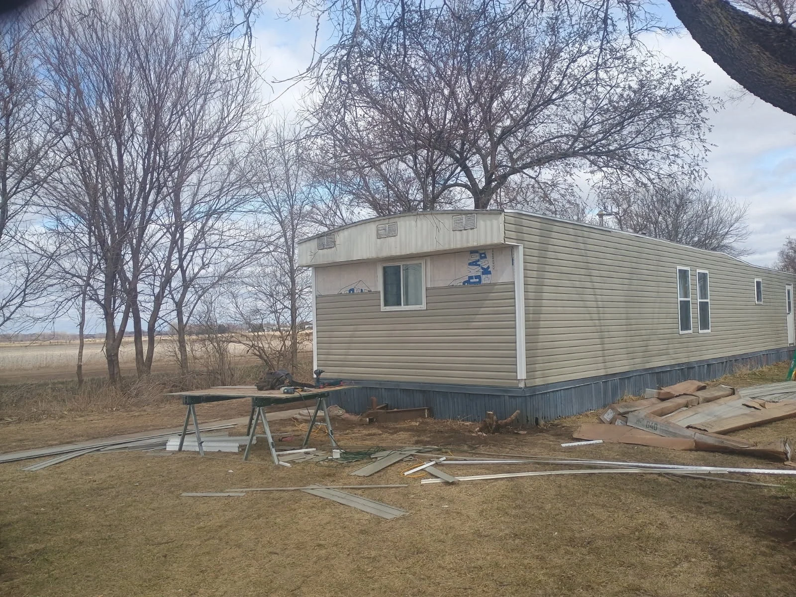 New siding and replacement windows on a mobile home.